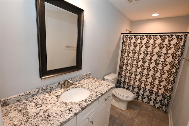 bathroom with toilet, vanity, a shower with shower curtain, and recessed lighting