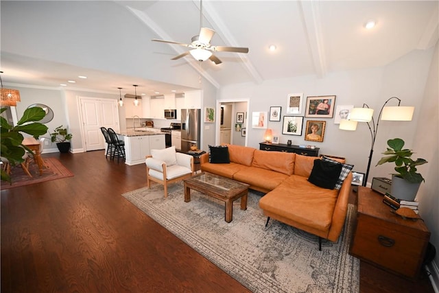 living room featuring a ceiling fan, dark wood finished floors, baseboards, beamed ceiling, and recessed lighting