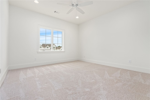 unfurnished room featuring carpet flooring and ceiling fan