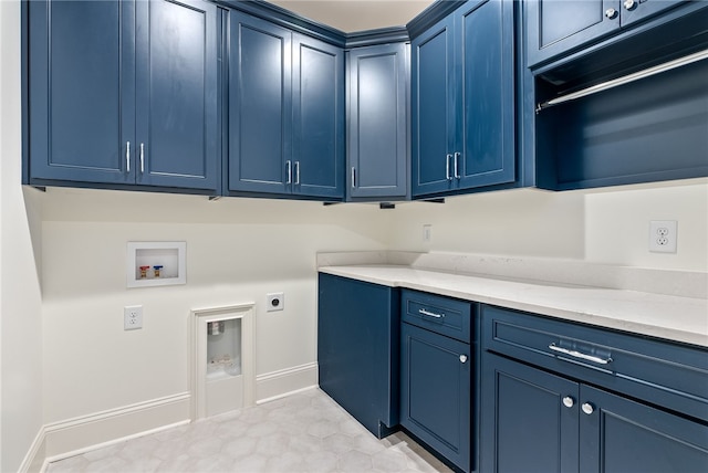 washroom featuring cabinets, washer hookup, and electric dryer hookup