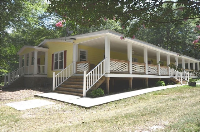 back of property featuring a porch