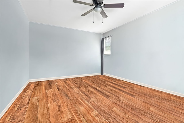 601 N Gay St Unit 202, Auburn, AL 36830 - unfurnished room featuring wood finished floors, crown molding, and a ceiling fan