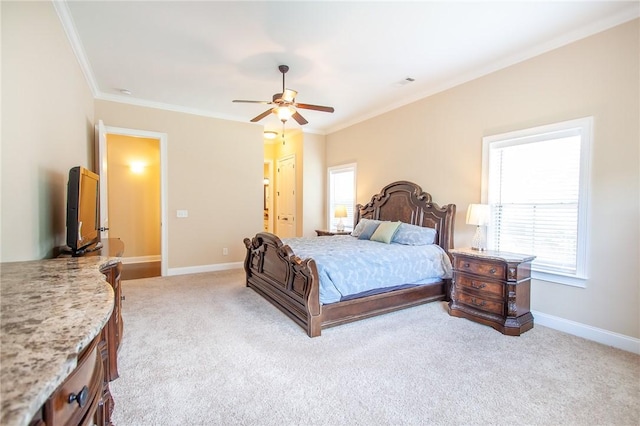 bedroom with ceiling fan, light colored carpet, and ornamental molding