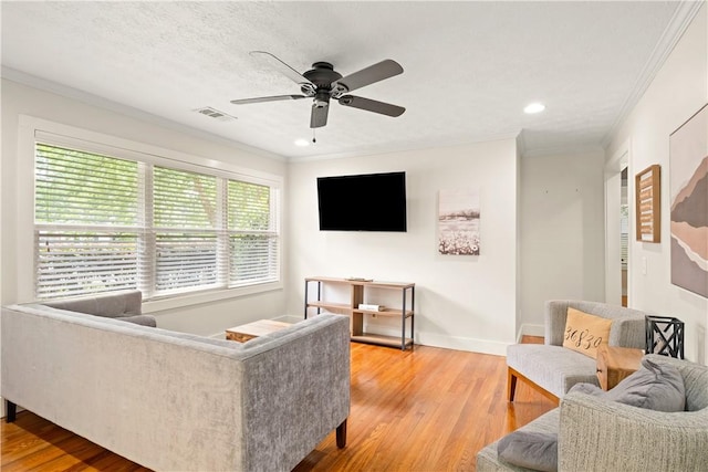 1016 E Magnolia Ave, Auburn, AL 36830 - living room with crown molding, ceiling fan, light wood-style flooring, and recessed lighting