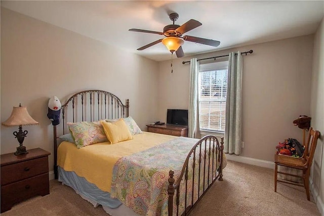 bedroom with light carpet and ceiling fan