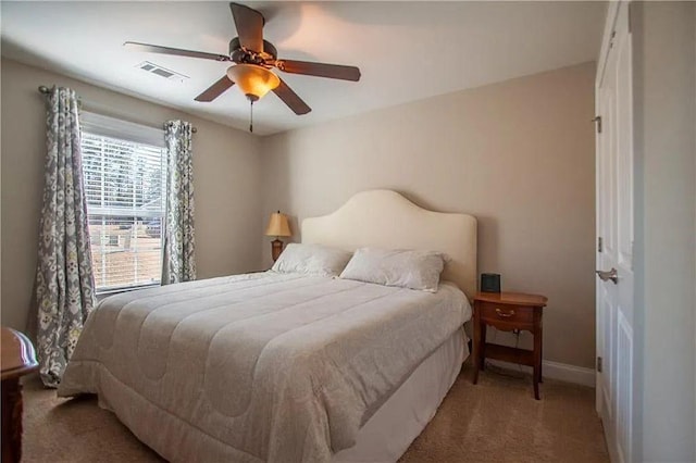 bedroom featuring ceiling fan and carpet floors