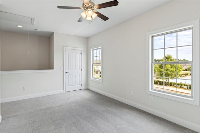 2260 Pam Cir, Auburn, AL 36832 - carpeted spare room featuring attic access, baseboards, and a ceiling fan