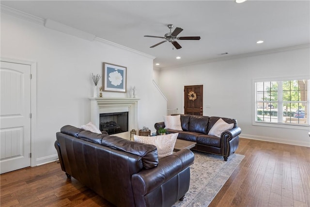 2260 Pam Cir, Auburn, AL 36832 - living area with ceiling fan, crown molding, dark wood-type flooring, a fireplace, and recessed lighting