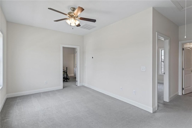 2260 Pam Cir, Auburn, AL 36832 - carpeted spare room featuring attic access, a ceiling fan, and baseboards