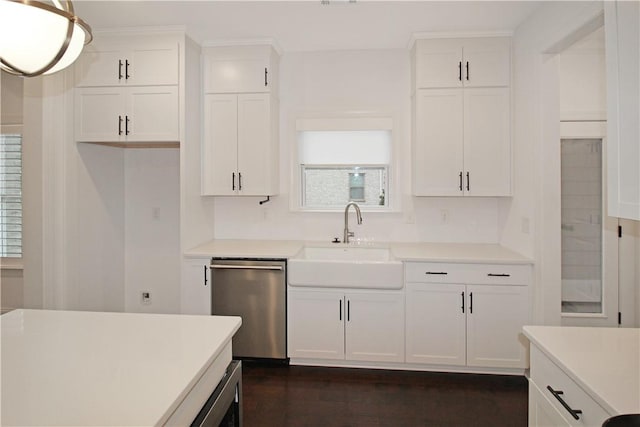 kitchen featuring sink, white cabinets, dishwasher, and plenty of natural light