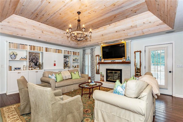 living room with a raised ceiling, wooden ceiling, a chandelier, and dark hardwood / wood-style floors