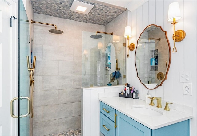 bathroom with vanity and an enclosed shower