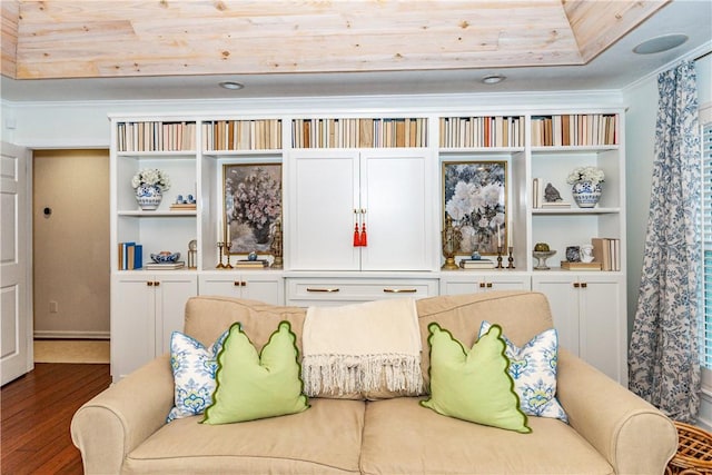 interior space with hardwood / wood-style flooring and crown molding