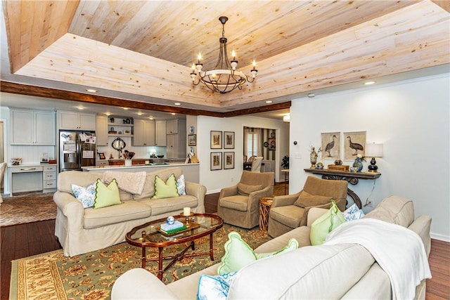 living room featuring a raised ceiling, hardwood / wood-style floors, wooden ceiling, and a notable chandelier