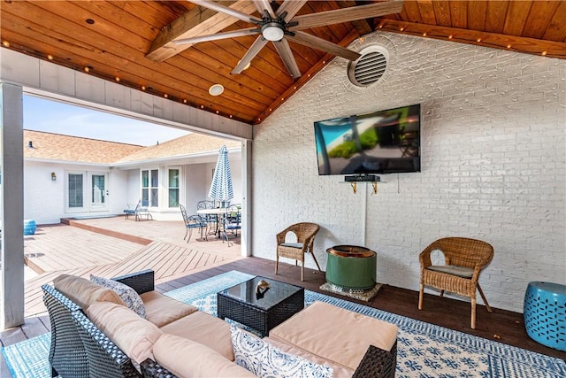 view of patio featuring french doors, an outdoor living space, and ceiling fan