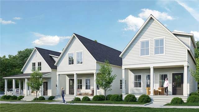 view of front of home with covered porch and a front yard