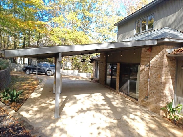 view of parking with a carport