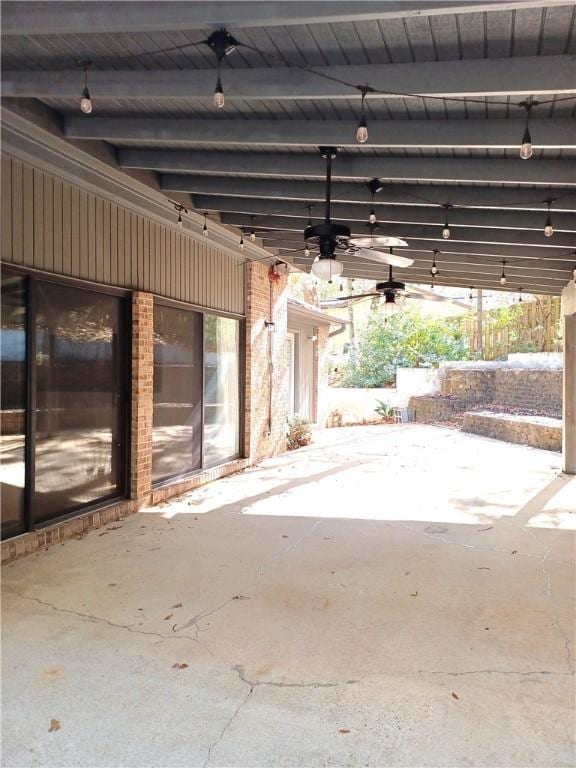 view of patio featuring ceiling fan