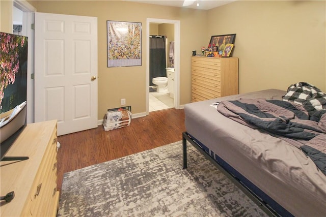 1477 N Donahue Dr Unit 3905, Auburn, AL 36830 - bedroom with wood finished floors, ensuite bath, and baseboards