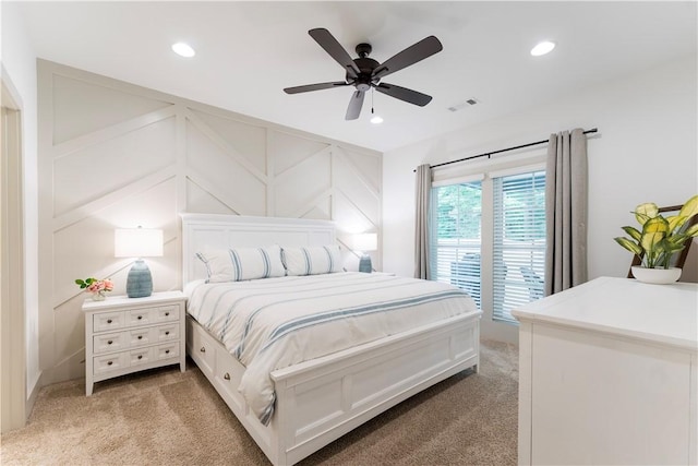 792 Village Dr, Opelika, AL 36801 - bedroom with light colored carpet, recessed lighting, a decorative wall, and ceiling fan