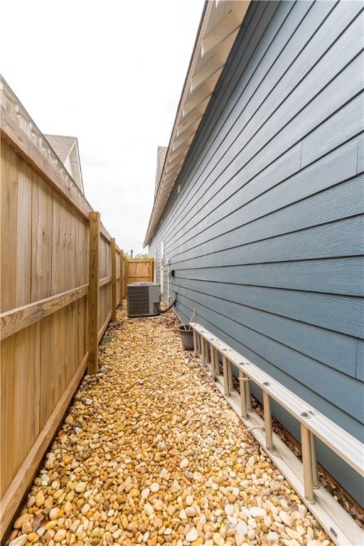 792 Village Dr, Opelika, AL 36801 - view of home's exterior with a central AC unit