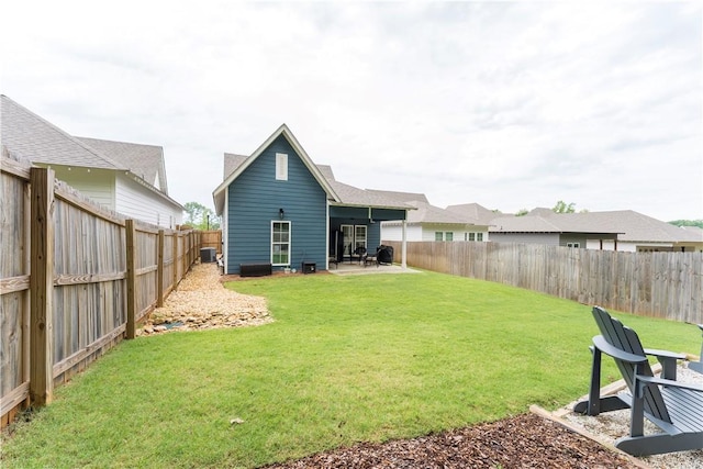 792 Village Dr, Opelika, AL 36801 - rear view of house with a fenced backyard and a patio
