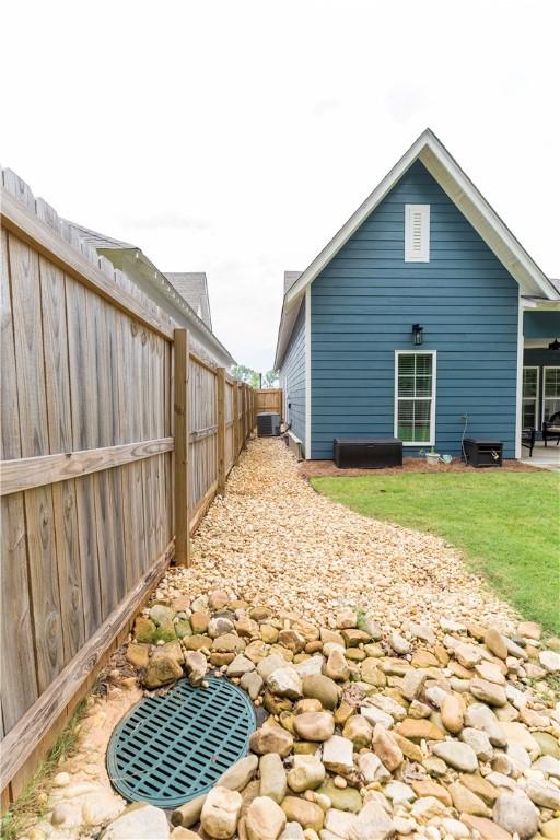 792 Village Dr, Opelika, AL 36801 - back of property with a fenced backyard