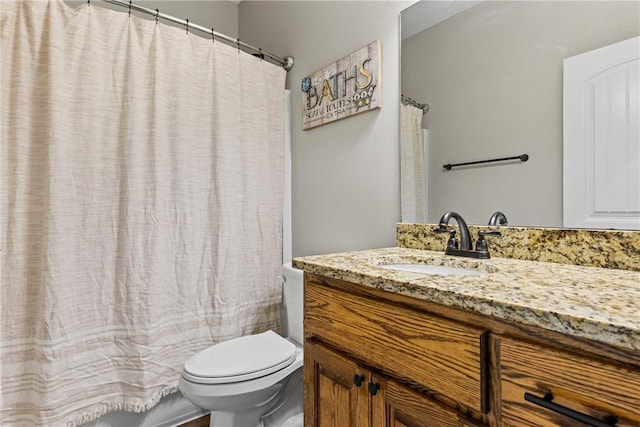 160 Indian Ln, Tallassee, AL 36078 - full bath featuring vanity, toilet, and shower / bath combo with shower curtain