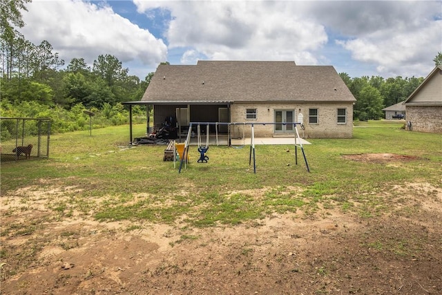 160 Indian Ln, Tallassee, AL 36078 - rear view of property featuring french doors, a yard, and a patio