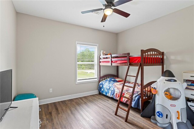 160 Indian Ln, Tallassee, AL 36078 - bedroom featuring wood finished floors, baseboards, and a ceiling fan