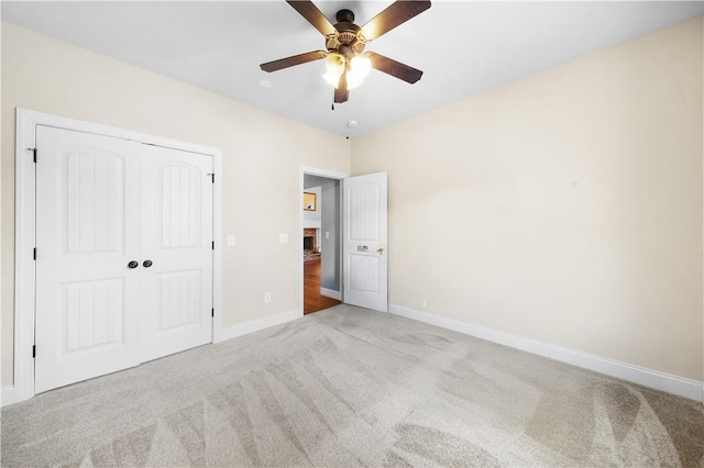 3204 Pinecrest Dr, Opelika, AL 36801 - unfurnished bedroom featuring carpet floors, a closet, and a ceiling fan