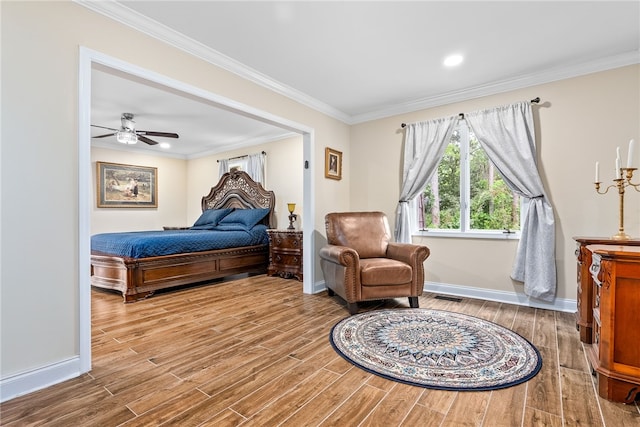 601 Overlook Dr, Opelika, AL 36801 - bedroom featuring baseboards, visible vents, wood finished floors, and crown molding