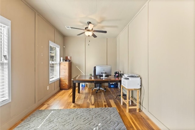 office area featuring ceiling fan and light hardwood / wood-style flooring