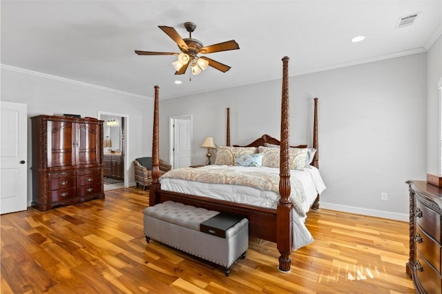 bedroom with ensuite bathroom, light hardwood / wood-style flooring, ceiling fan, and crown molding