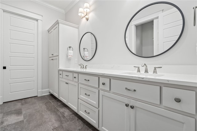 bathroom with vanity and ornamental molding