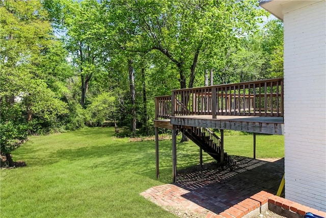 view of yard featuring a wooden deck