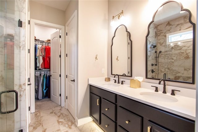 bathroom with vanity and walk in shower