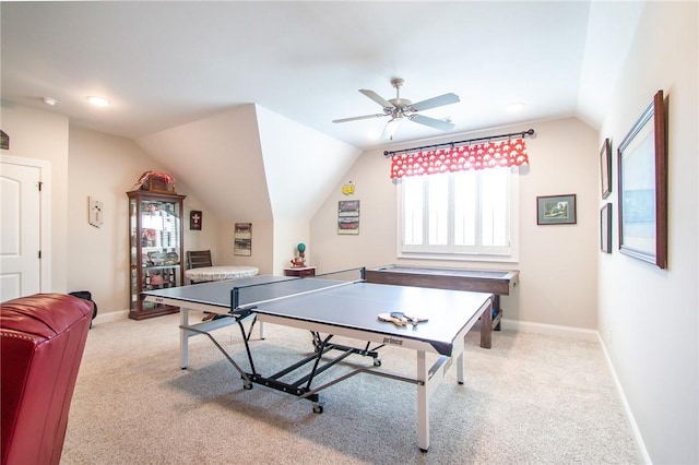 game room featuring ceiling fan, lofted ceiling, and light carpet