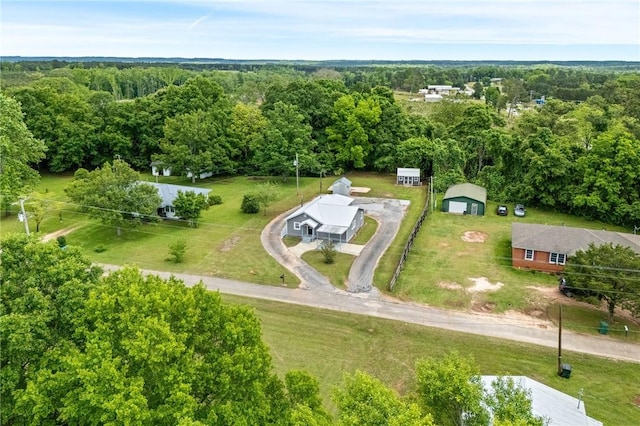 drone / aerial view of a heavily wooded area