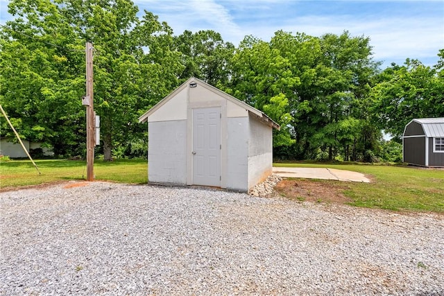 view of shed with view of wooded area