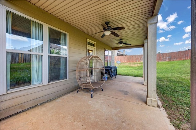 151 Landing Way, Smiths Station, AL 36877 - fenced backyard featuring ceiling fan, a patio area, and area for grilling