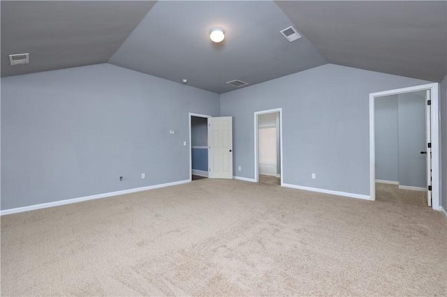 151 Landing Way, Smiths Station, AL 36877 - unfurnished bedroom featuring vaulted ceiling and carpet
