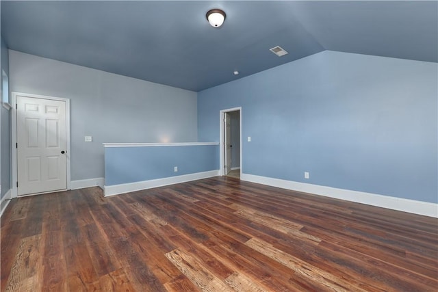 151 Landing Way, Smiths Station, AL 36877 - unfurnished room with dark wood finished floors and lofted ceiling