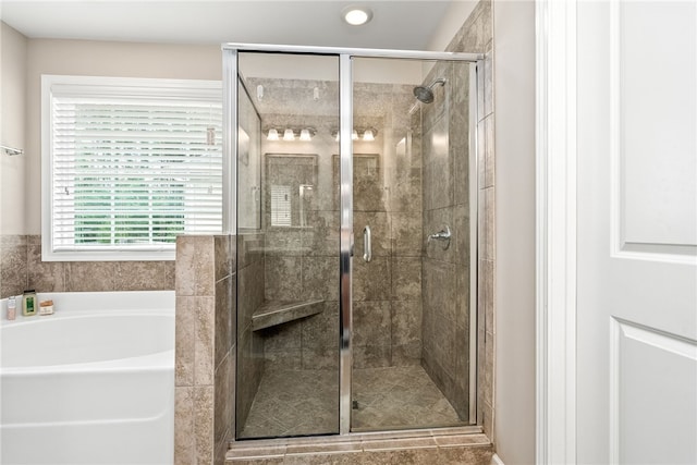 2655 Anderson Ct, Auburn, AL 36832 - bathroom featuring a garden tub, a stall shower, and recessed lighting