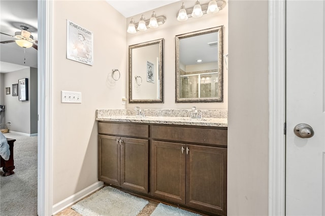 2655 Anderson Ct, Auburn, AL 36832 - full bath featuring a ceiling fan, double vanity, and an enclosed shower
