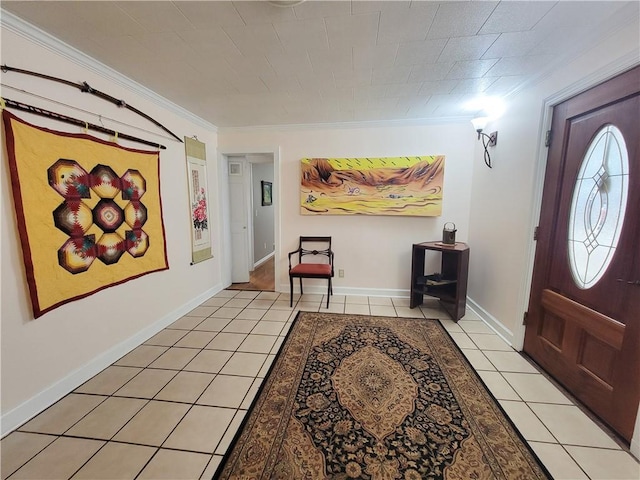 tiled entrance foyer with crown molding