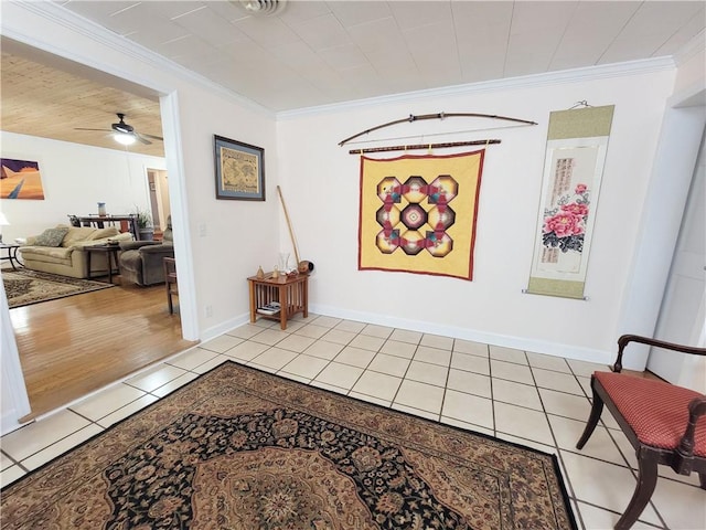 hall with light tile patterned floors and ornamental molding