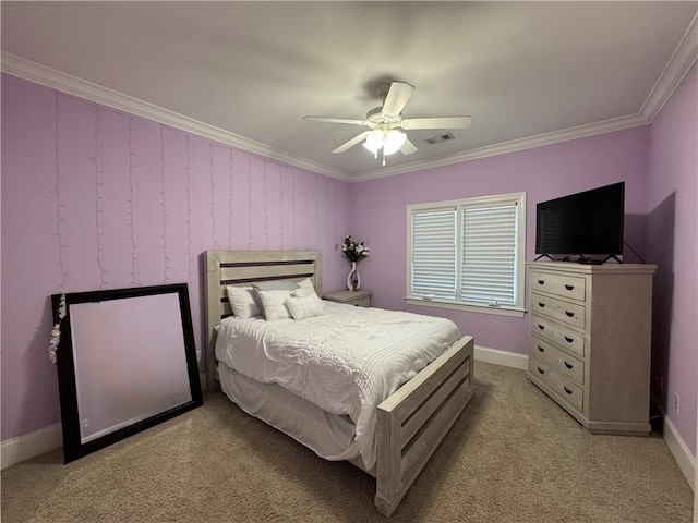 bedroom featuring ceiling fan, crown molding, light colored carpet, and baseboards