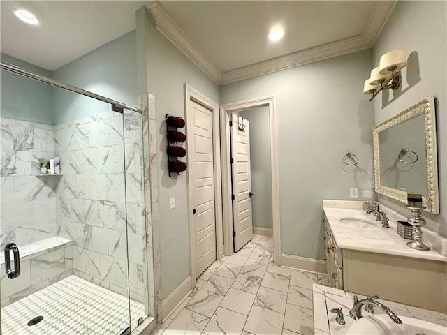 full bathroom featuring vanity, baseboards, ornamental molding, a shower stall, and marble finish floor