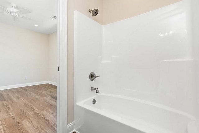 3260 Academy Dr Unit 408, Opelika, AL 36801 - full bathroom featuring shower / bathtub combination, wood finished floors, and ceiling fan